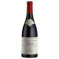 A bottle of Boutinot Seguret red wine. It has a white label with black and red writing and a picture of a bee. The bottle has a red foil capsule.
