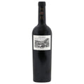 A bottle of Coto Real Rioja red wine, featuring a dark glass bottle with a white vintage-style label and gold foil on the neck, set against a plain white background.