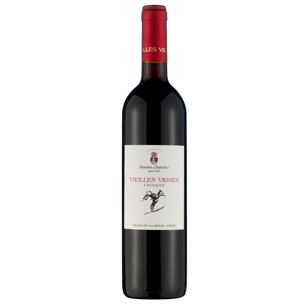 A bottle of red wine from Domaine d'Tourelles specifically Cinsault Vieilles Vignes , with a dark glass bottle, a white label, and a red foil capsule on a white background.