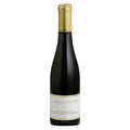 Dessert wine bottle with gold cap and label on a white background