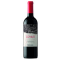 A bottle of Coyam Los Robles Estate red wine from Emiliana, featuring a dark glass bottle with a vibrant red foil capsule and a white label with a black wood grain design.