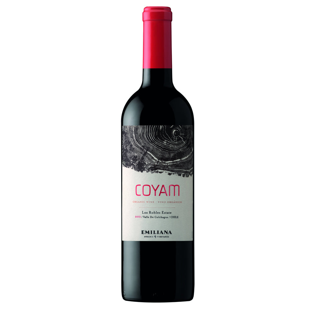 A bottle of Coyam Los Robles Estate red wine from Emiliana, featuring a dark glass bottle with a vibrant red foil capsule and a white label with a black wood grain design.