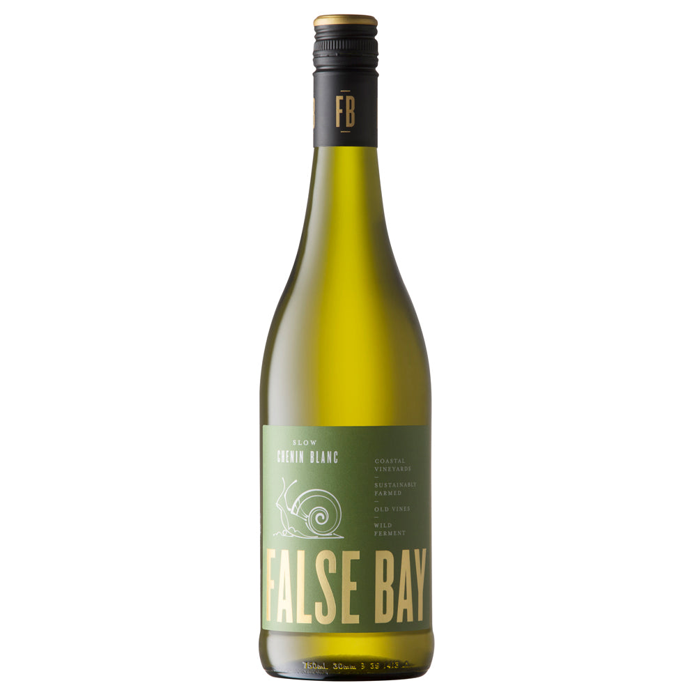 A bottle of False Bay Chenin Blanc white wine on a solid white background. The bottle is made of olive-green glass, featuring a dark olive-green label with a snail illustration and gold lettering, sealed with a black screw cap.