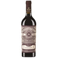 A bottle of Montepulciano d'Abruzzo Gran Sasso red wine, featuring a dark brown glass bottle with a cream and brown vintage-style label and a dark brown capsule, isolated on a white background.