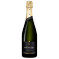 A bottle of Gremillet Champagne, featuring a dark green glass bottle with a gold foil top and a black label with gold lettering.