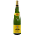 A bottle of Hugel Classic Riesling. The bottle is green with a yellow label and gold foil capsule. All set on a white background