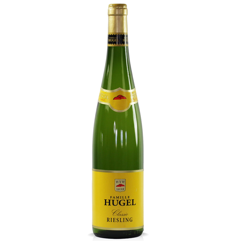 A bottle of Hugel Classic Riesling. The bottle is green with a yellow label and gold foil capsule. All set on a white background