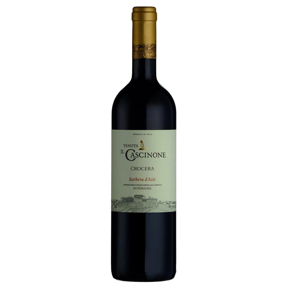 A bottle of Il Cascinone Crocera Barbera d'Asti red wine, featuring a dark glass bottle with a gold foil capsule and a light green label, set against a plain white background.