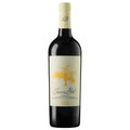 A bottle of Juan Gil Yellow Label Monastrell red wine, featuring a dark glass body, a cream-coloured label with a gold tree illustration, and a cream-coloured foil-wrapped neck, set against a plain white background.