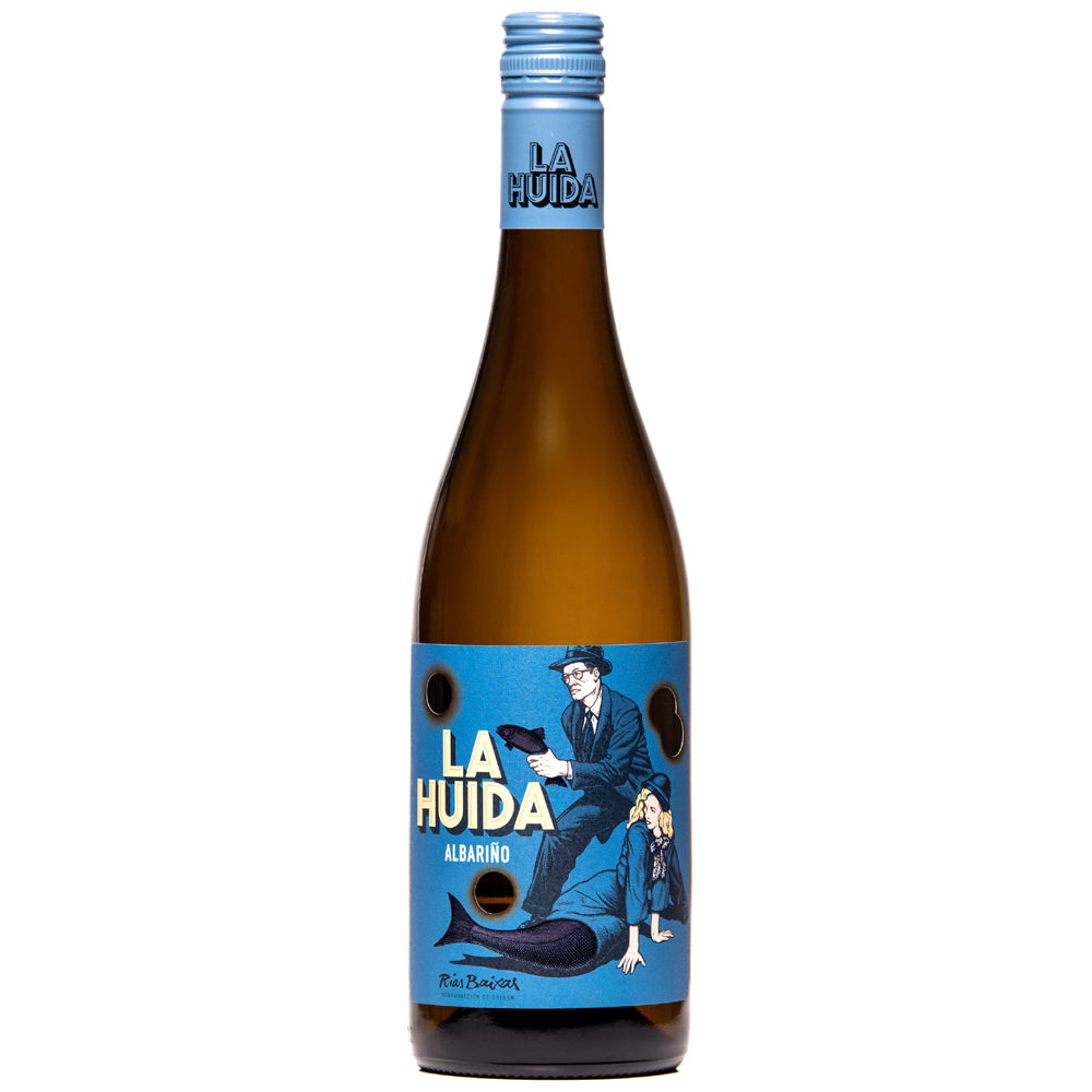 A bottle of La Huida Albarino. It has a brown bottle with a blue label and blue screwcap showing a humorous image. All set on a white background.