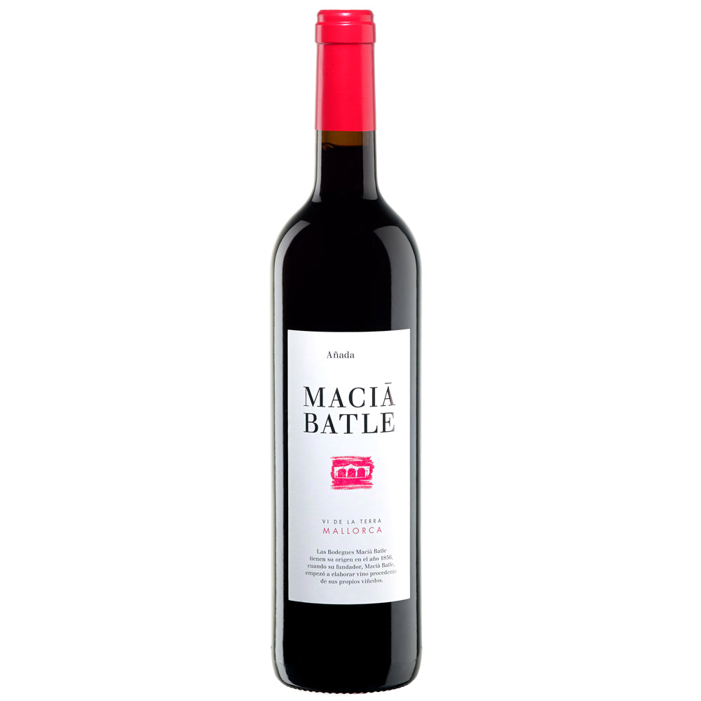 A bottle of Macia Batle Anada red wine from Spain. It has a white label and red foil capsule. It is all set on a white background.
