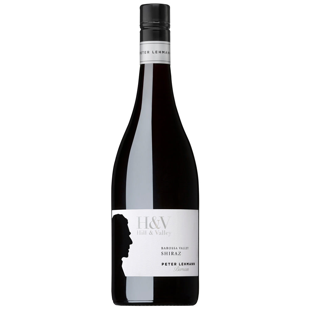 A bottle of Peter Lehmann Hill & Valley Shiraz. It has a white label with the profile of the winemaker to one side. It has a black and silver screw cap.