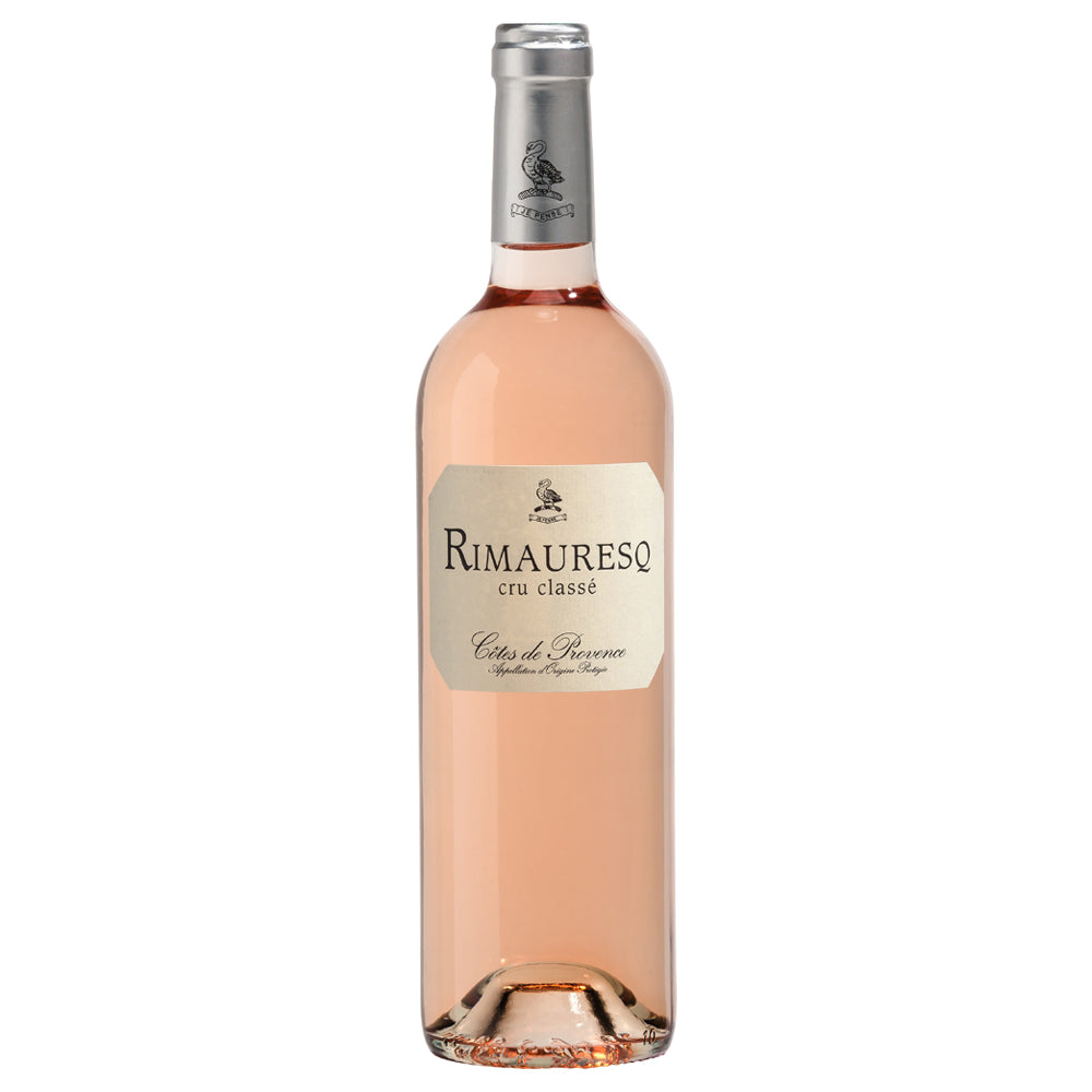 A bottle of Rimauresq Cru Classe rosé wine with a pale pink wine, a cream-colored label, and a silver foil cap, shown against a plain white background.