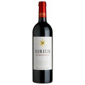 A bottle of Sichel Sirius Bordeaux red wine. It has a white label with a red foil capsule.
