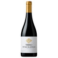 A bottle of Tabali Vetas Blancas Pinot Noir red wine with a dark glass body, a white label with gold detailing, and a gold foil capsule at the neck, set against a plain white background.