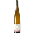 A bottle of Turckheim Grand Cru Brand Gewurztraminer white wine, featuring a dark olive-green glass bottle, a black neck wrap with gold foil, and a cream-colored label with gold and burgundy text.