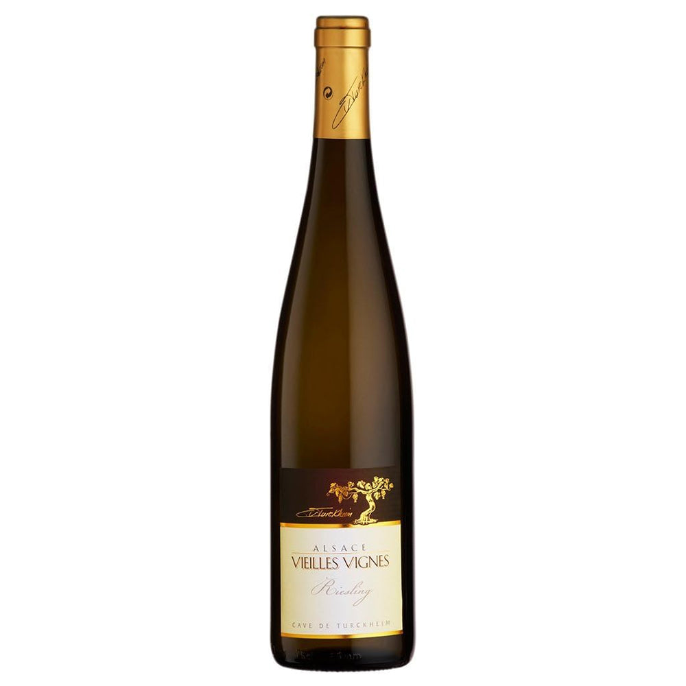 A bottle of Turckheim Vieilles Vignes Riesling wine, featuring a dark brown glass bottle with a gold foil top and a cream-colored label with gold accents.