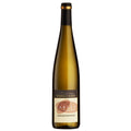 A bottle of Turckheim Sables et Galets Gewürztraminer wine with a dark green/brown glass body, a black and gold foil top, and a cream-colored label featuring a brown and gold design.