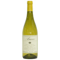 A bottle of Villa Bucci white wine in a green glass bottle, a yellow foil capsule, and a cream-colored label.
